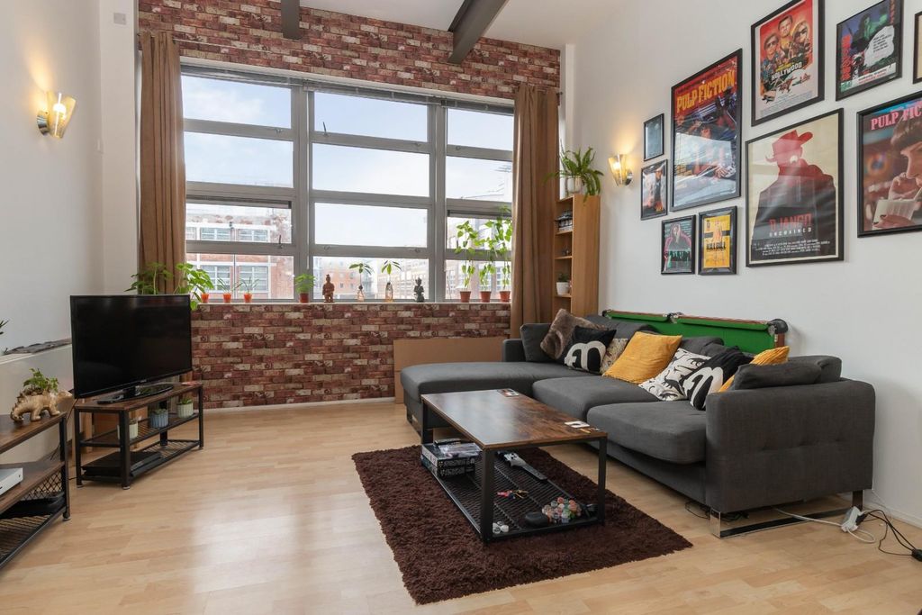 Property photo 1 of 13 Living Area