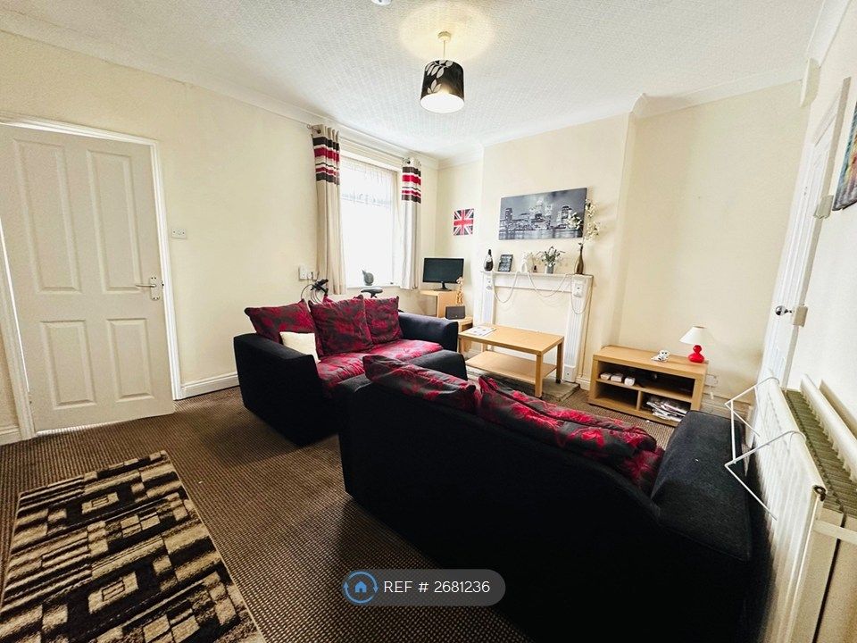 Property photo 2 of 7 Living Area