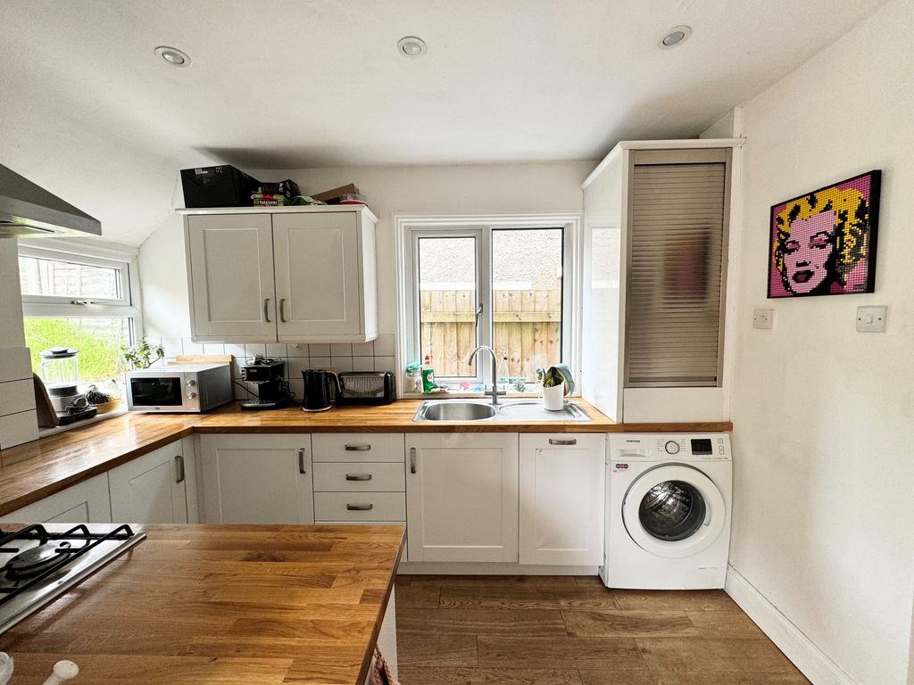 Property photo 3 of 12 Kitchen