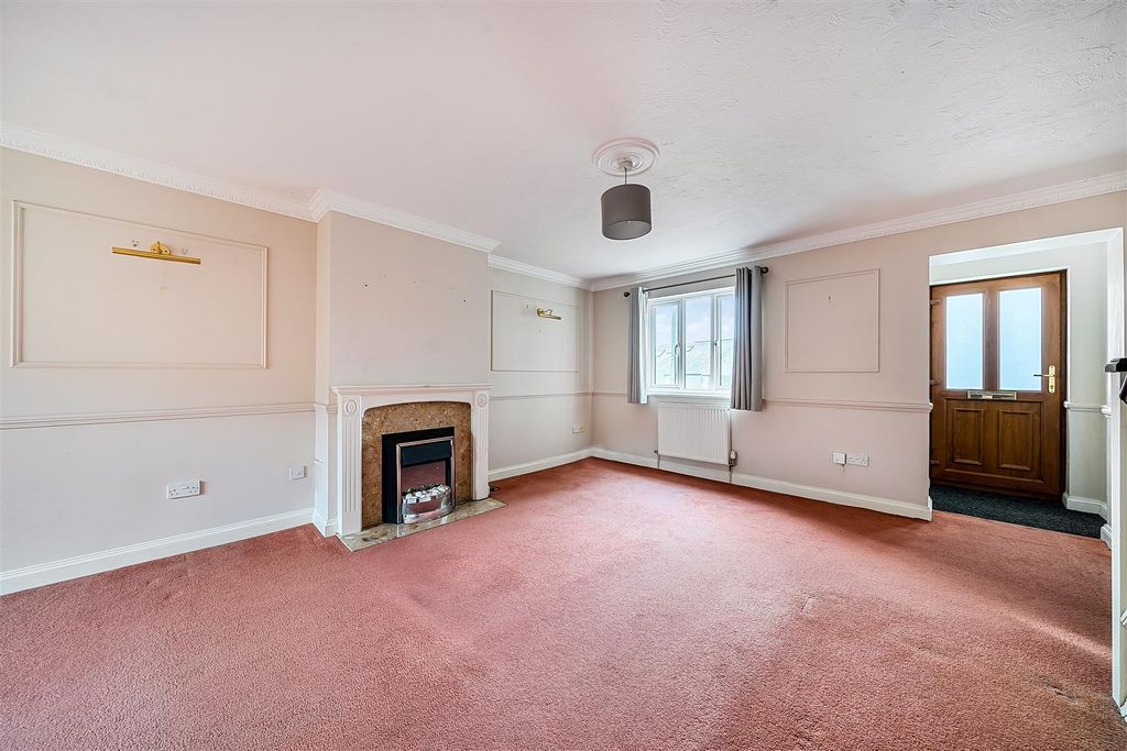 Property photo 2 of 13 Sitting Room With Feature Fireplace