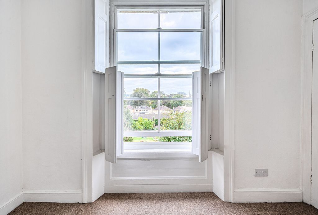 Property photo 3 of 9 Shuttered Windows
