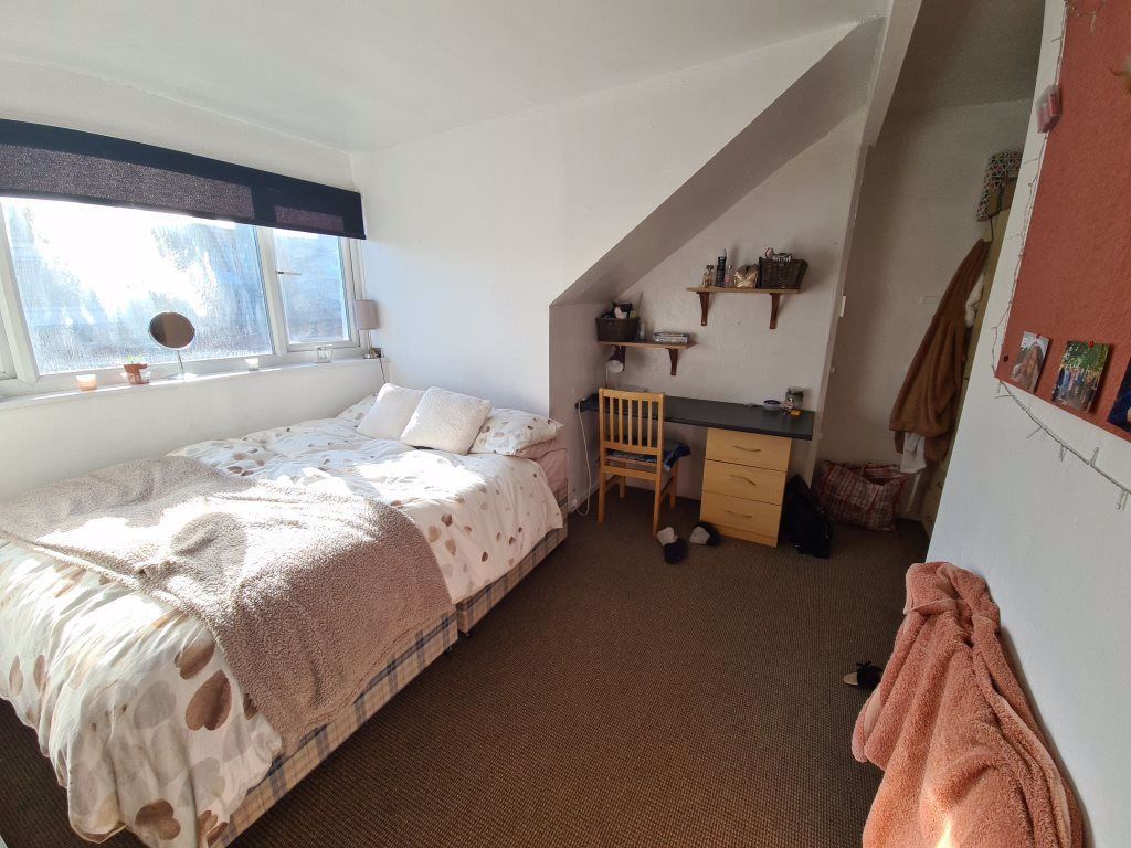 Property photo 3 of 9 Cozy Single Bedroom Featuring A Large Window That ...