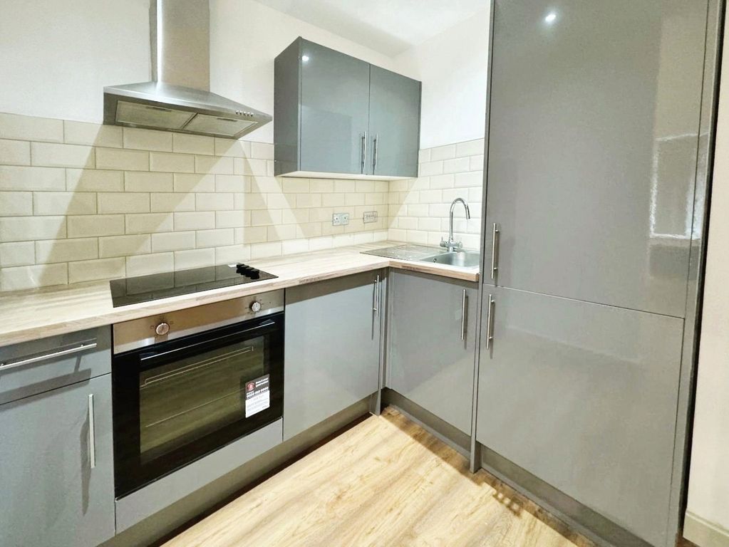 Property photo 2 of 6 Kitchen Area