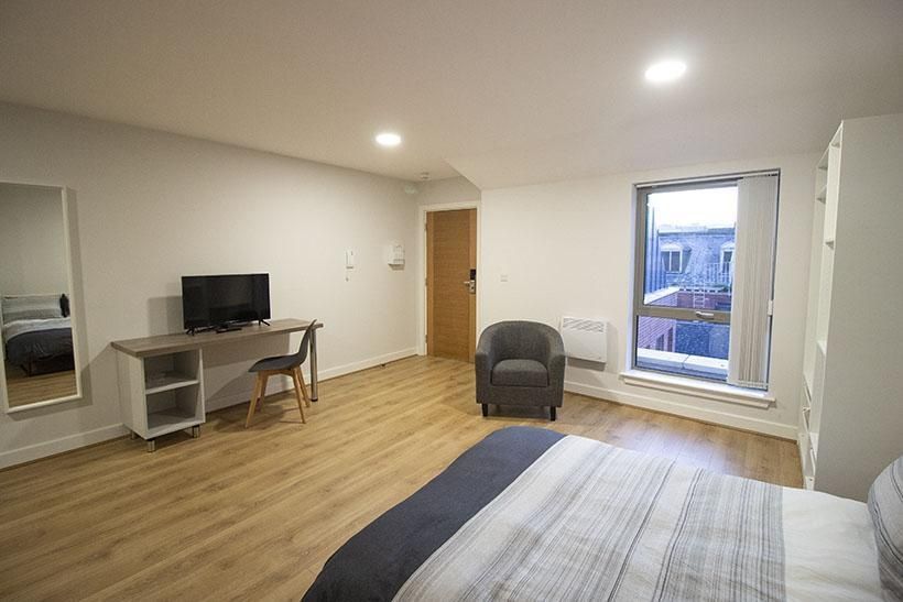 Property photo 2 of 7 Bright And Spacious Master Bedroom Featuring A Com...