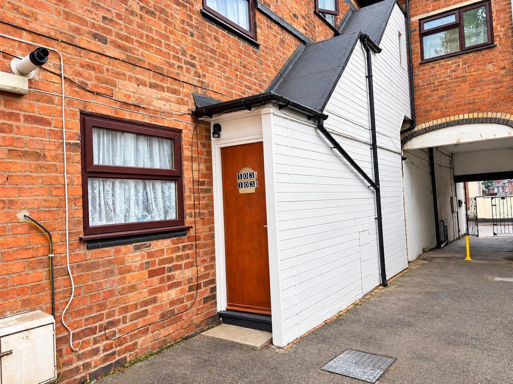 Property photo 1 of 6 Brick Entrance With White Porch And Alleyway.Png