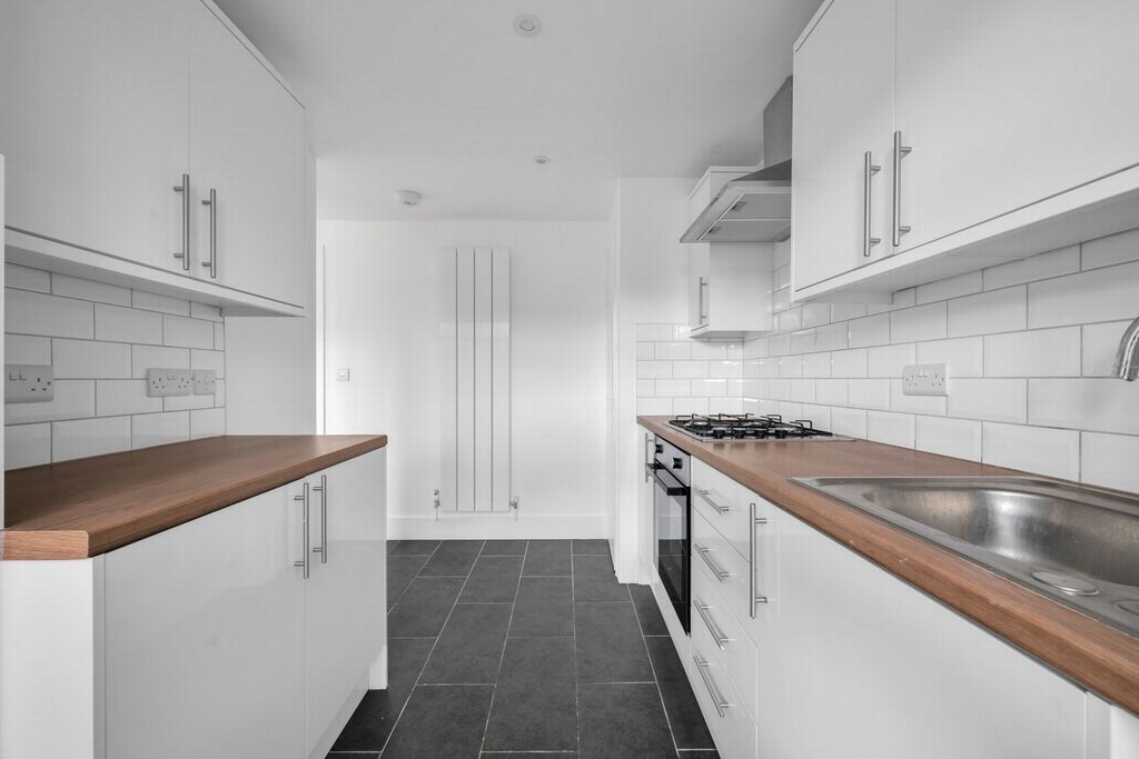 Property photo 3 of 12 Kitchen
