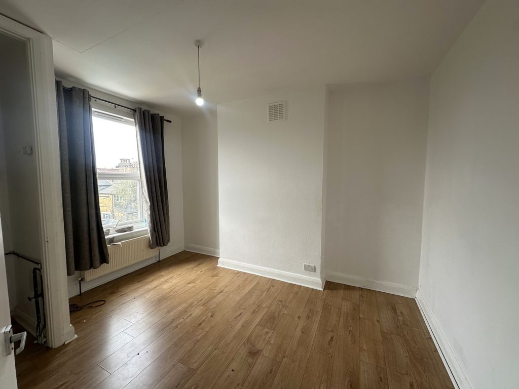 Property photo 3 of 5 Bright Bedroom With Large Window And Wood Floor...