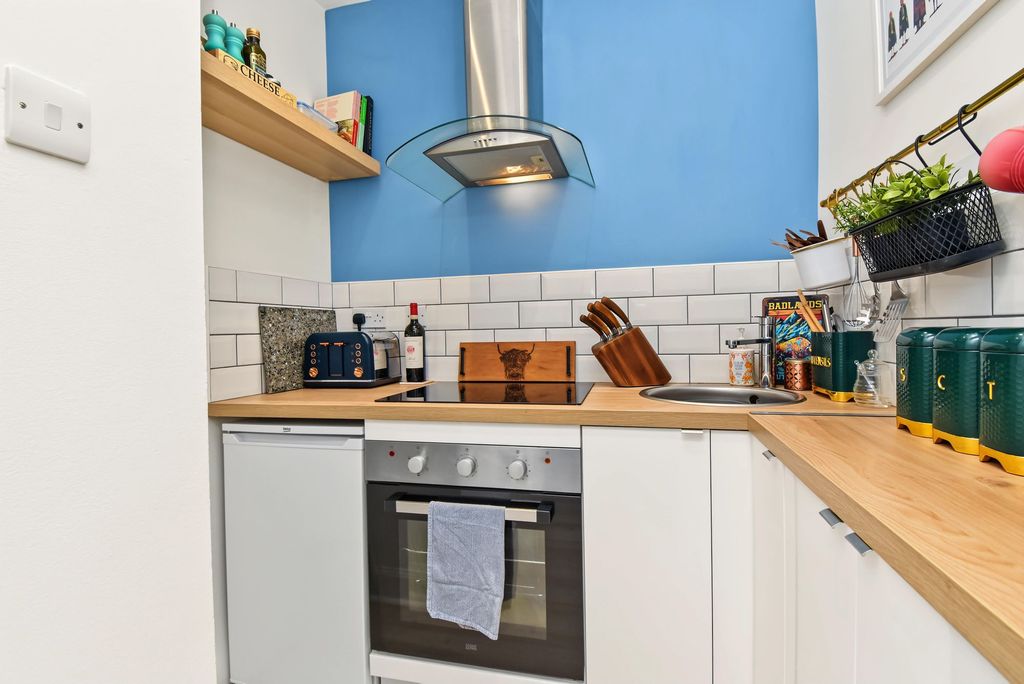 Property photo 3 of 12 Kitchen