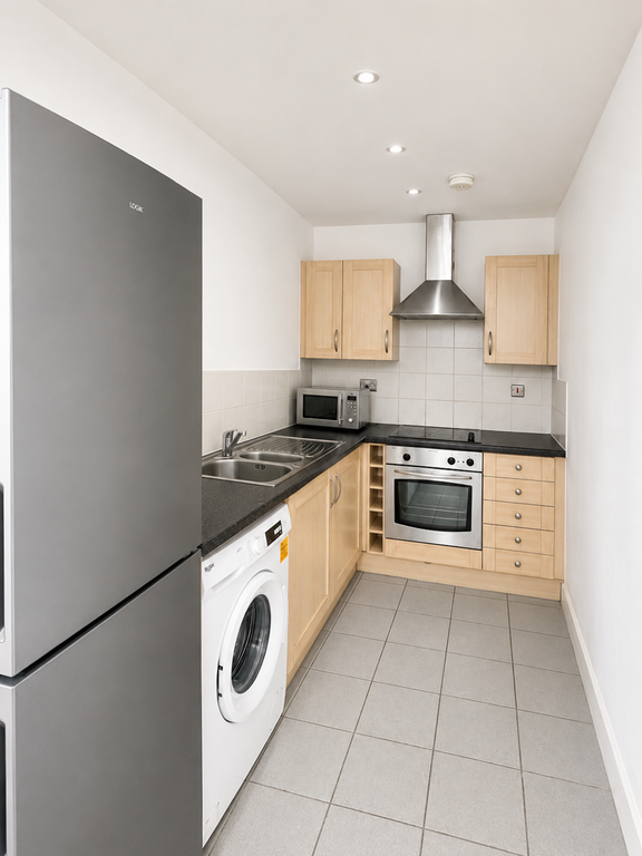 Property photo 3 of 12 Kitchen