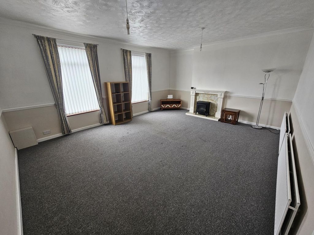 Property photo 2 of 12 Living Room