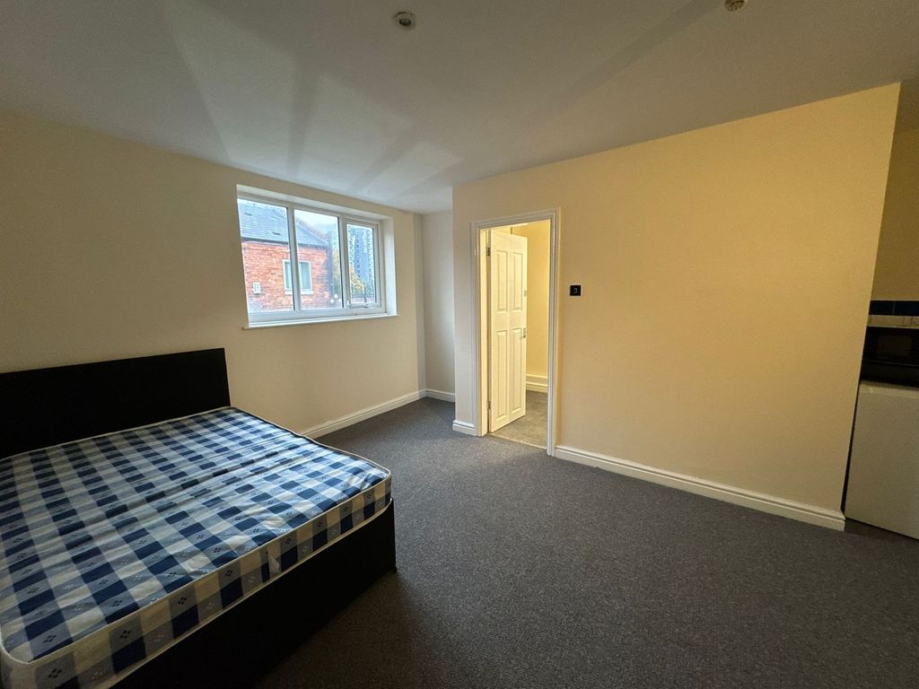 Property photo 1 of 3 A Tidy Bedroom Featuring A Window Allowing Natural...