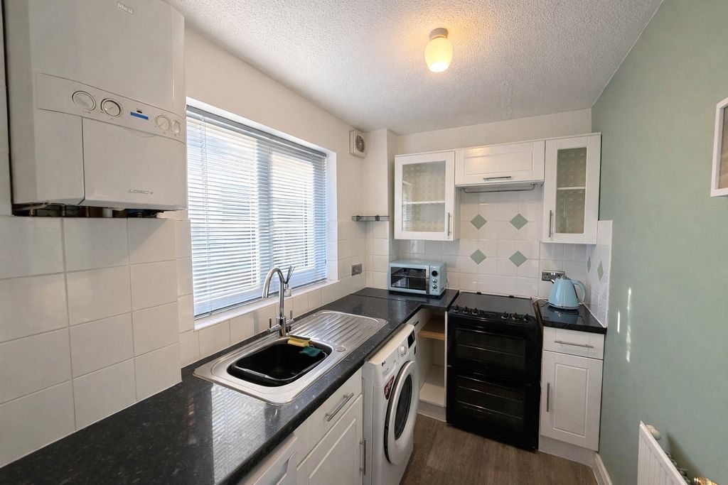 Property photo 2 of 12 Kitchen