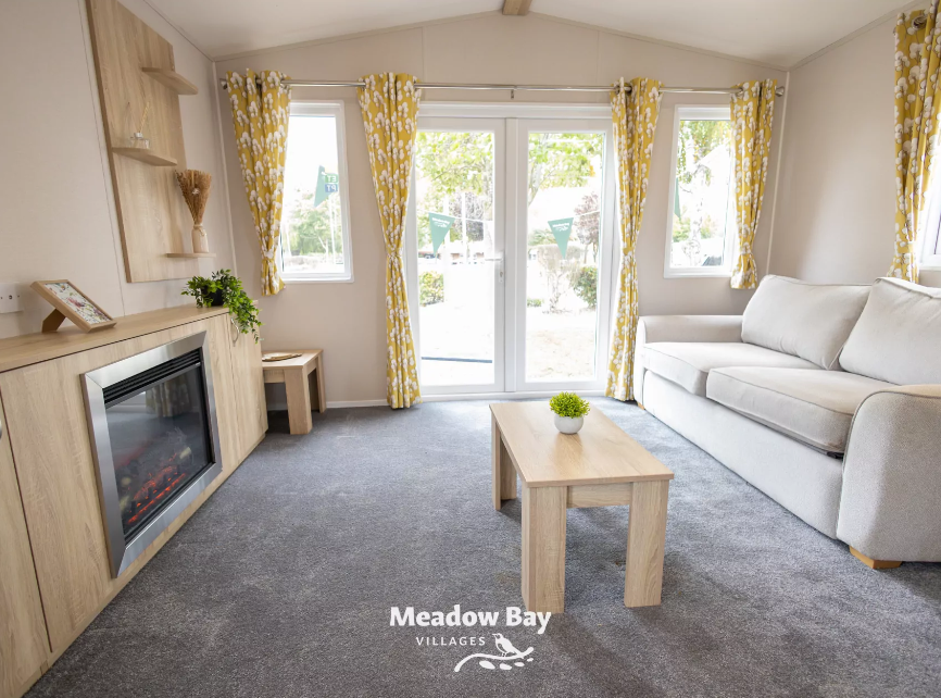 Property photo 1 of 16 Bright Lounge With Patio Doors, Sofa And Feature Fireplace