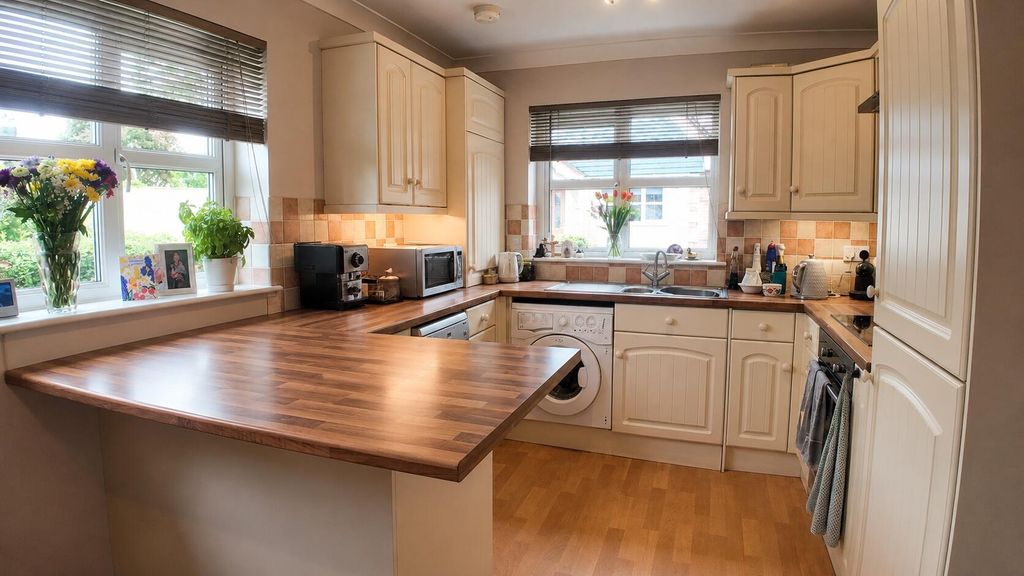 Property photo 2 of 12 Kitchen