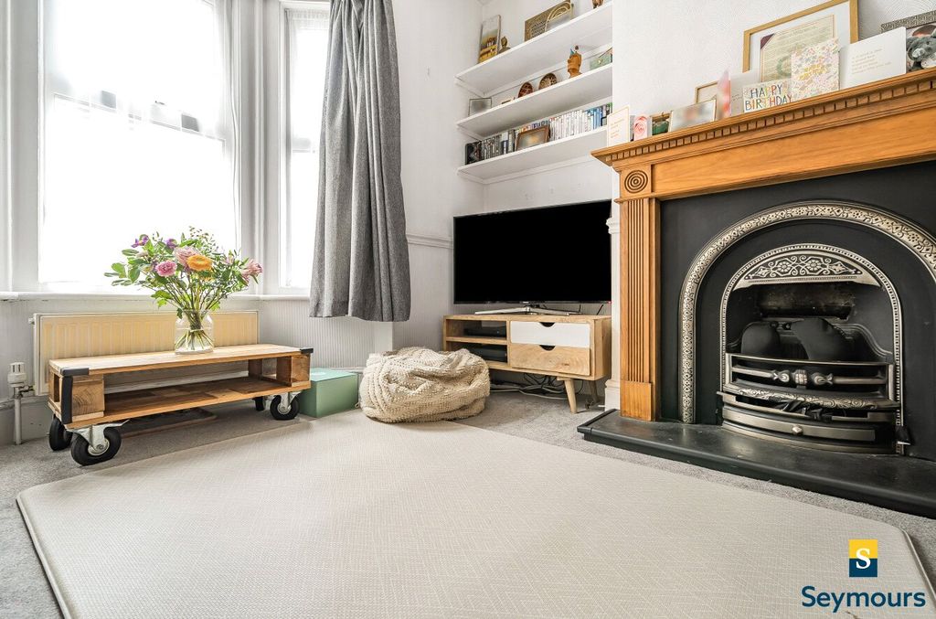 Property photo 3 of 12 Fireplace