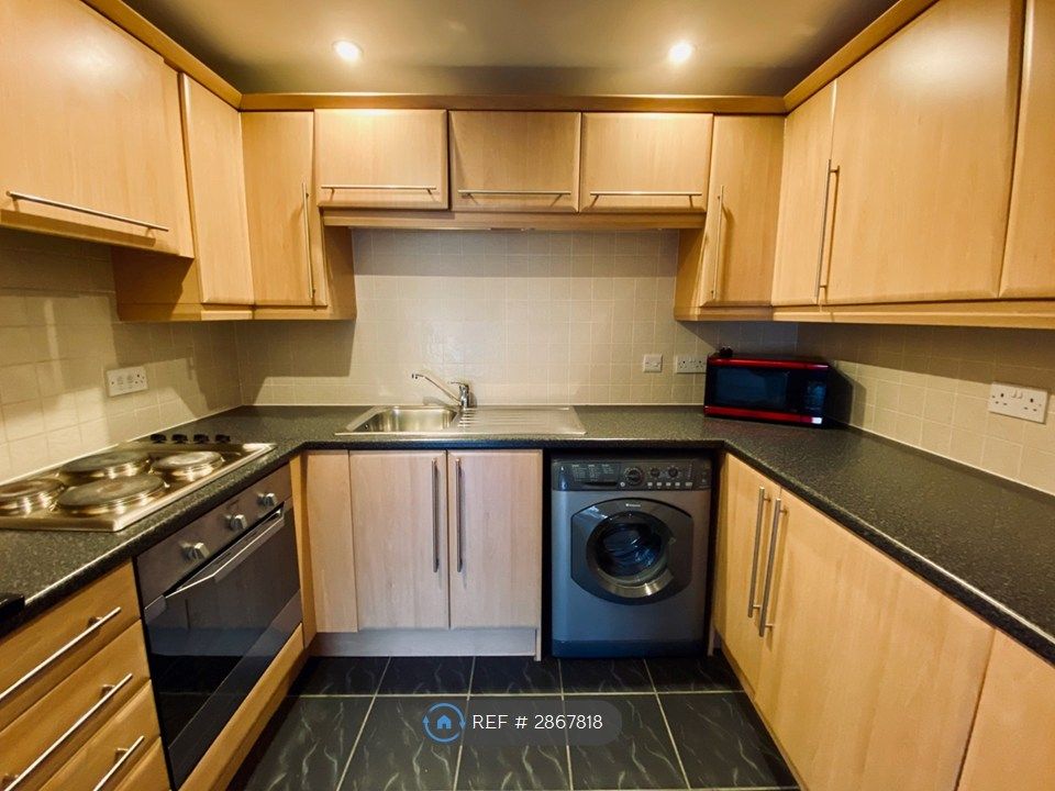 Property photo 3 of 12 Kitchen