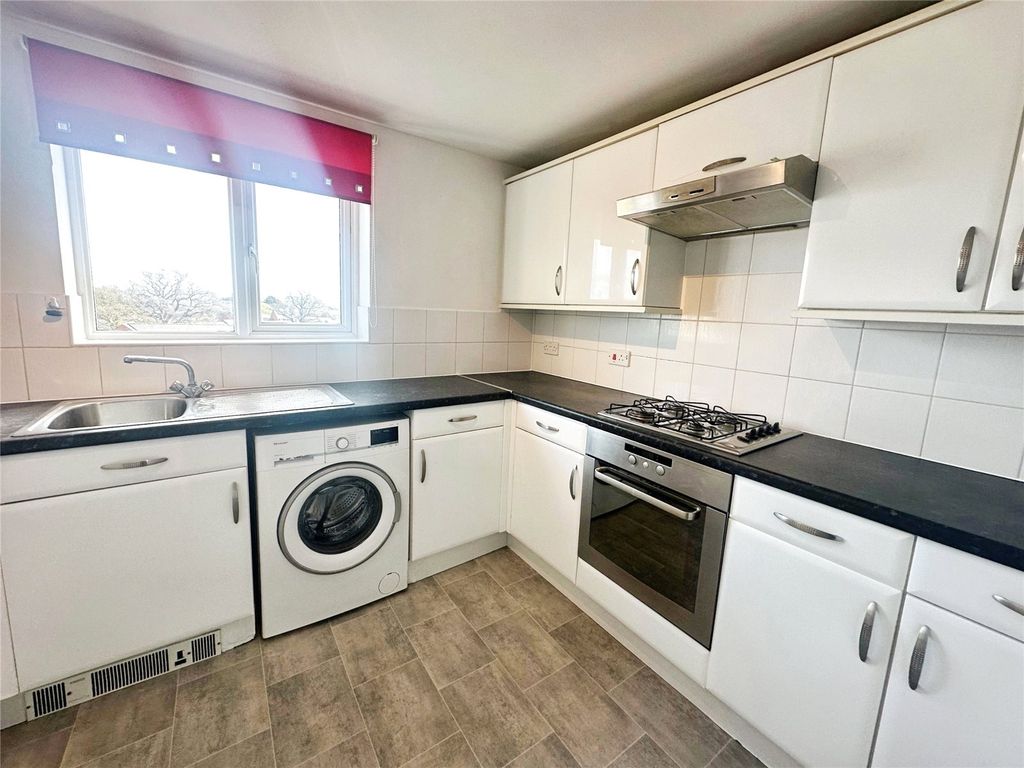 Property photo 3 of 12 Kitchen