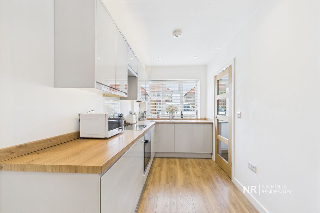 Property photo 2 of 13 Kitchen Area