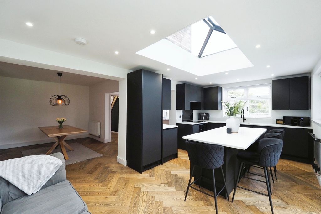 Property photo 3 of 20 Breathtaking Kitchen And Dining Space Filled With Natural Light