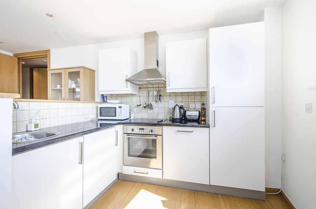 Property photo 3 of 8 Kitchen