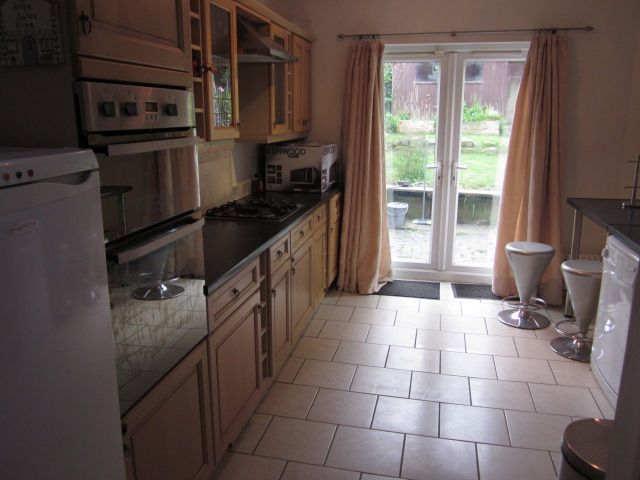 Property photo 1 of 10 Stylish Kitchen