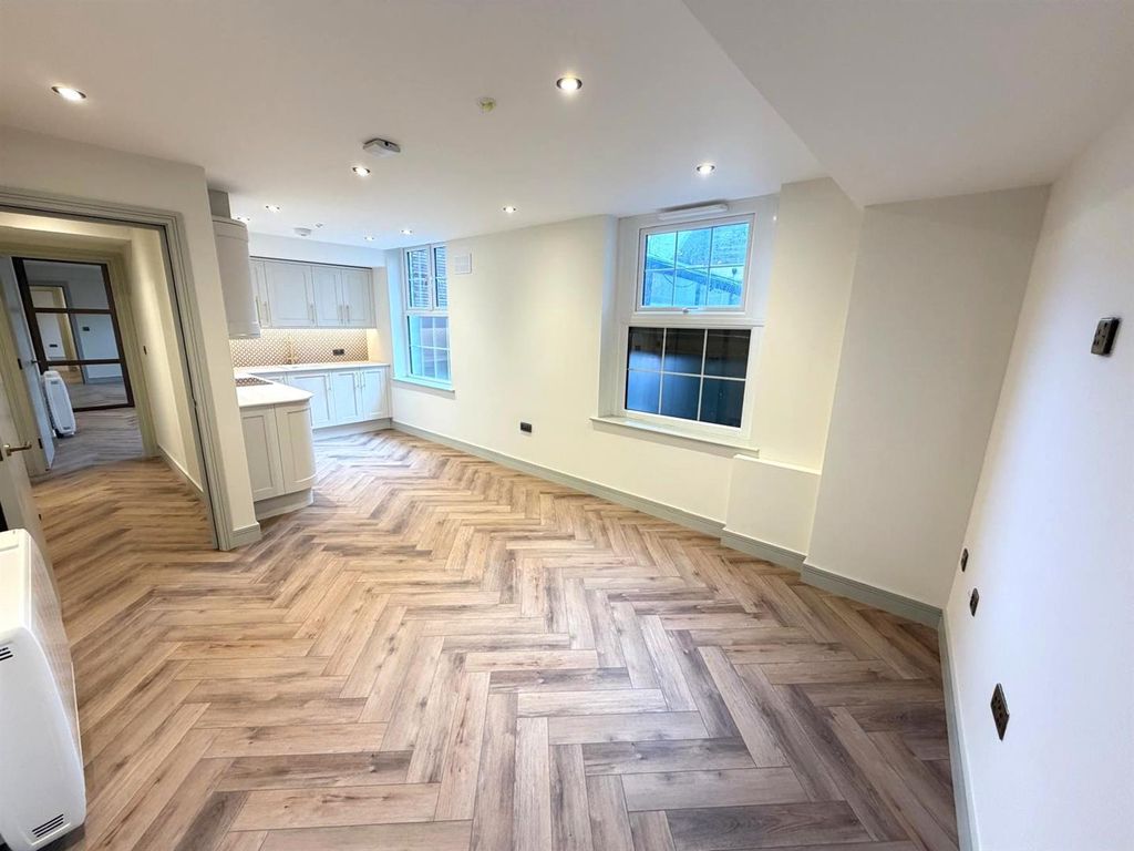 Property photo 2 of 5 1H - Living Room.Jpg