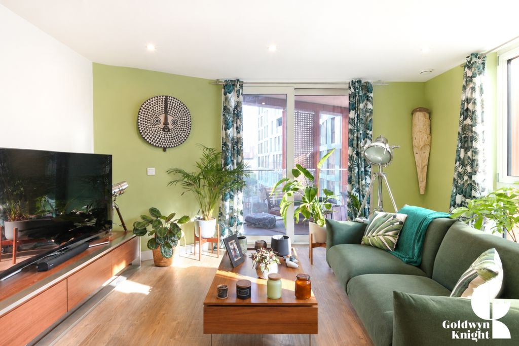 Property photo 2 of 19 Bright Modern Green Living Room
