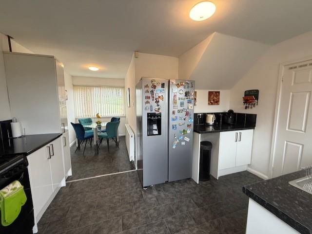 Property photo 3 of 16 Dining Kitchen