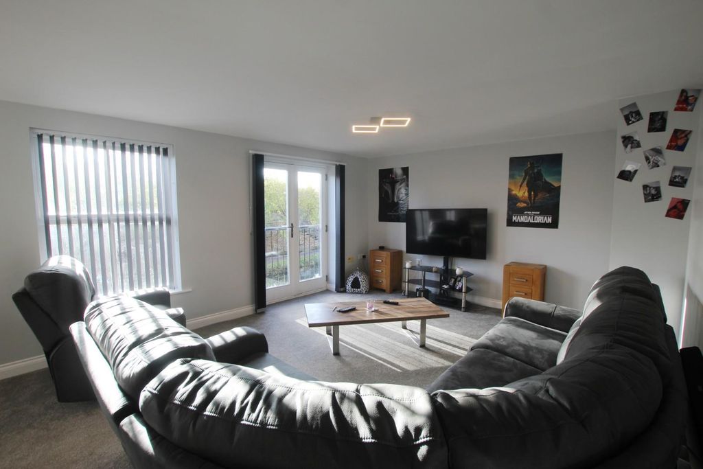 Property photo 2 of 10 Living Area