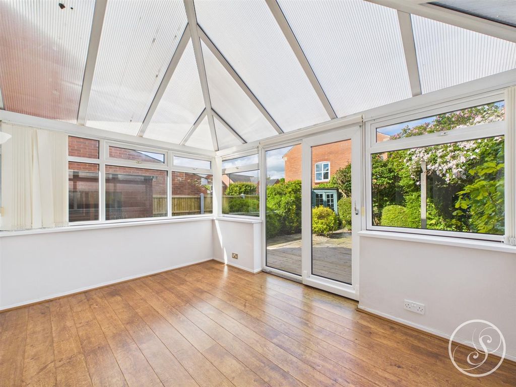 Property photo 3 of 16 Conservatory