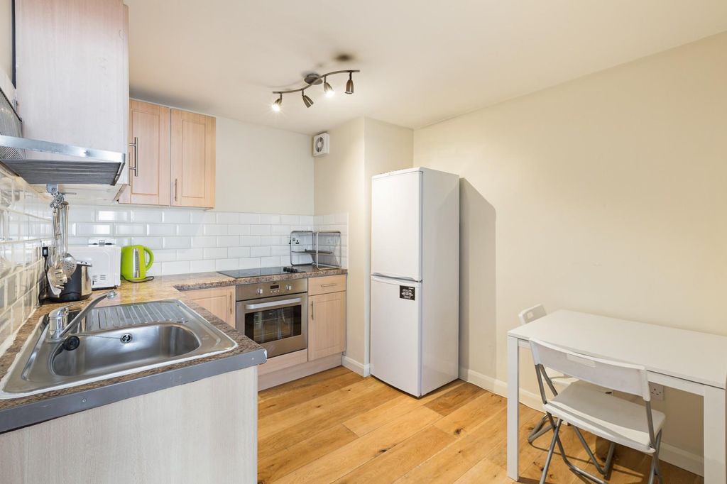 Property photo 3 of 8 Kitchen