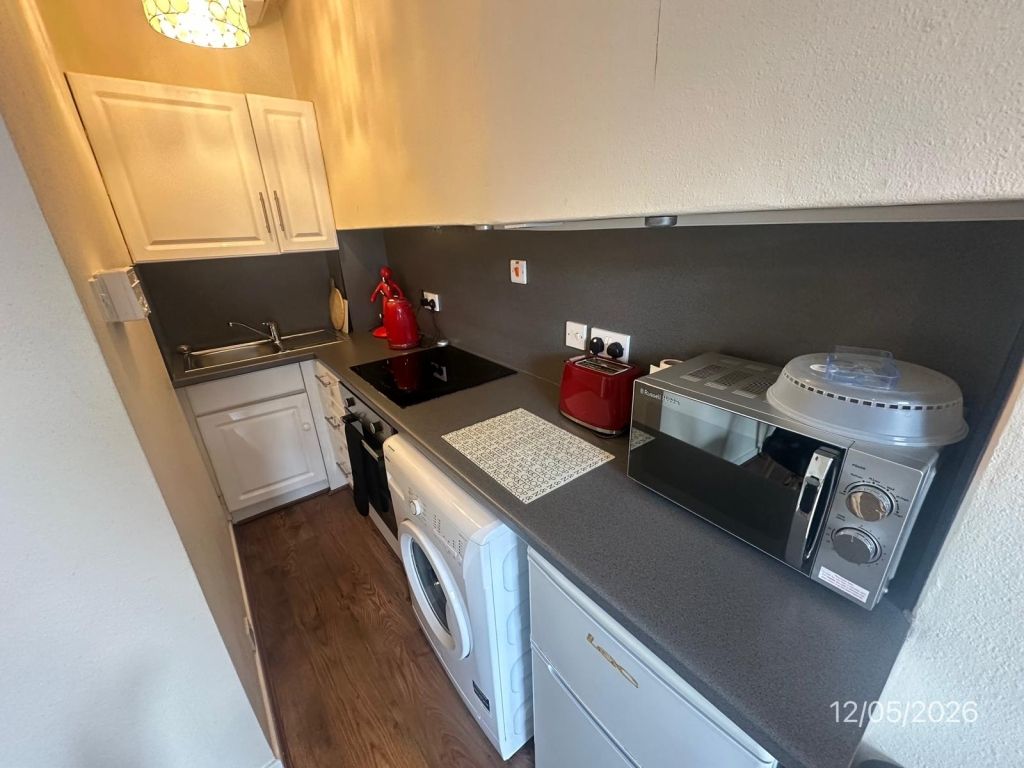 Property photo 2 of 8 Kitchen
