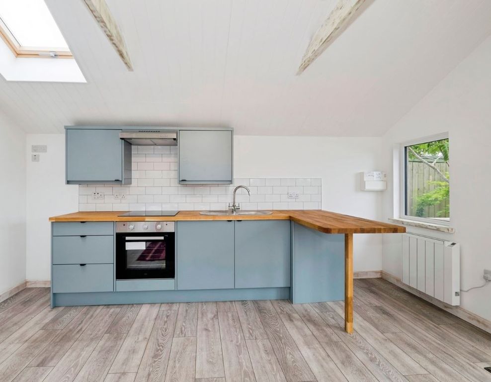 Property photo 2 of 6 Kitchen Area