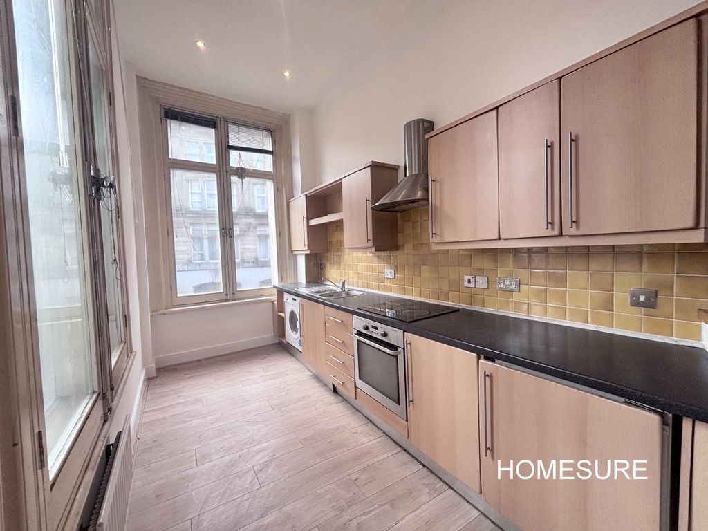 Property photo 3 of 9 Kitchen