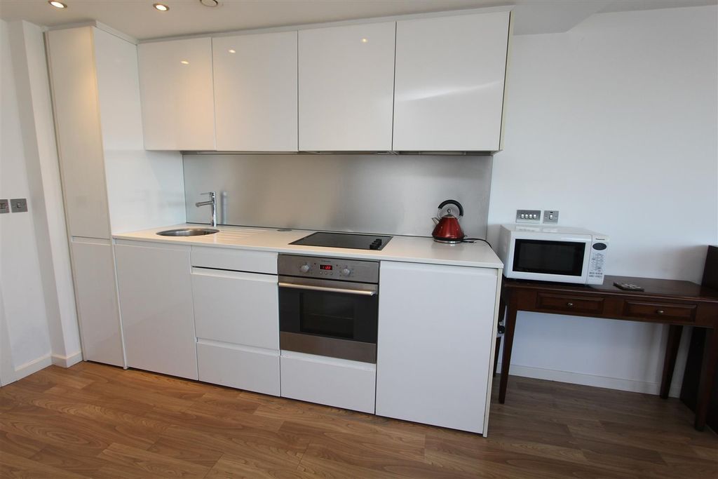 Property photo 3 of 11 Modern White Kitchen With Sleek Fitted Appliances...