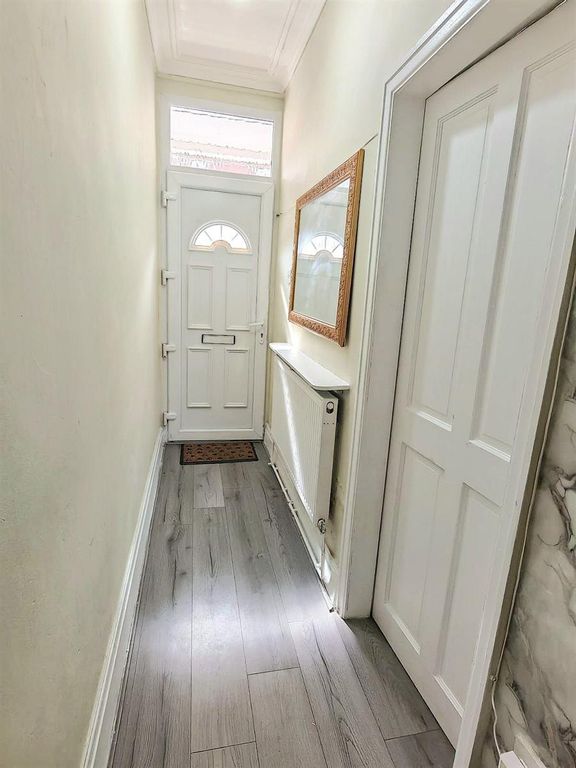 Property photo 1 of 13 Bright Hallway With Modern Wood-Effect Flooring....