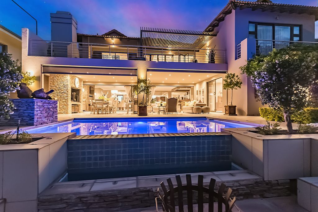 Property photo 1 of 66 Evening View Of The Pool