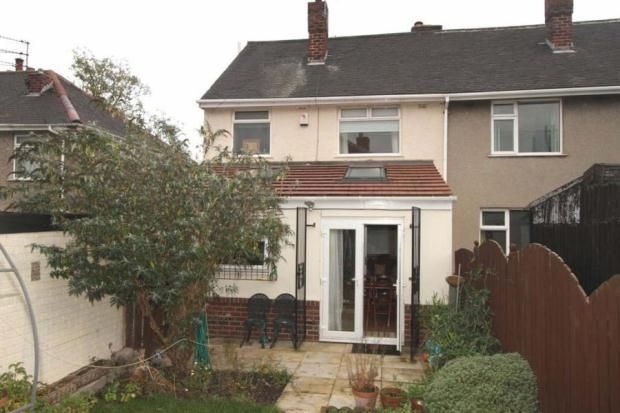 Property photo 2 of 9 A Well-Maintained Garden Area Featuring A Paved Pa...