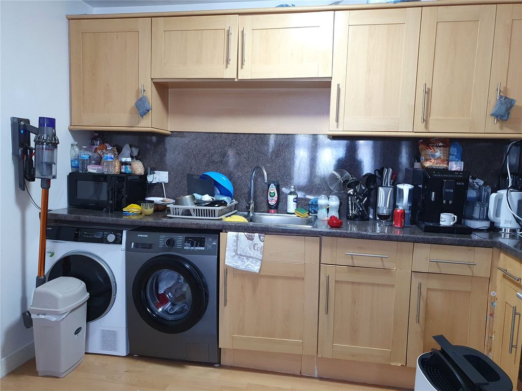 Property photo 3 of 7 Kitchen Area