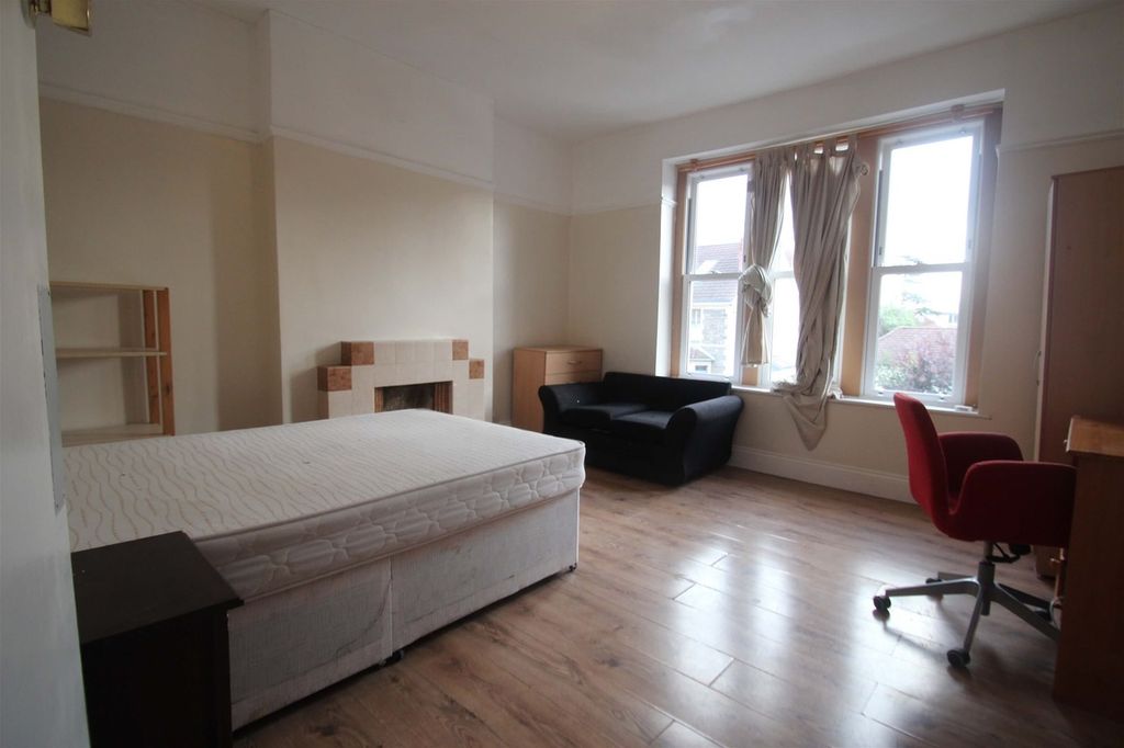 Property photo 3 of 4 Spacious Double Bedroom Featuring Large Windows Th...