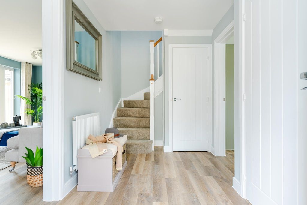 Property photo 1 of 11 The Welcoming Entrance Hallway Is A Light And Airy Space Within The Spacious Trusdale