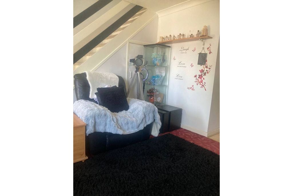 Property photo 3 of 19 Living Area