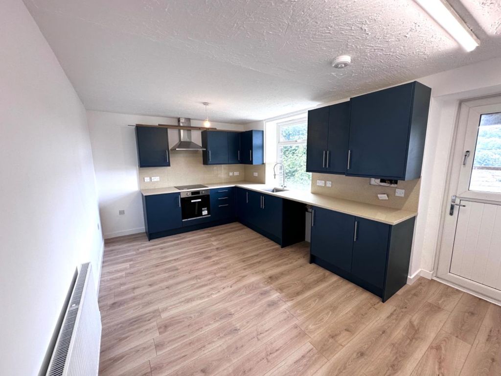 Property photo 2 of 12 Kitchen Dining Room