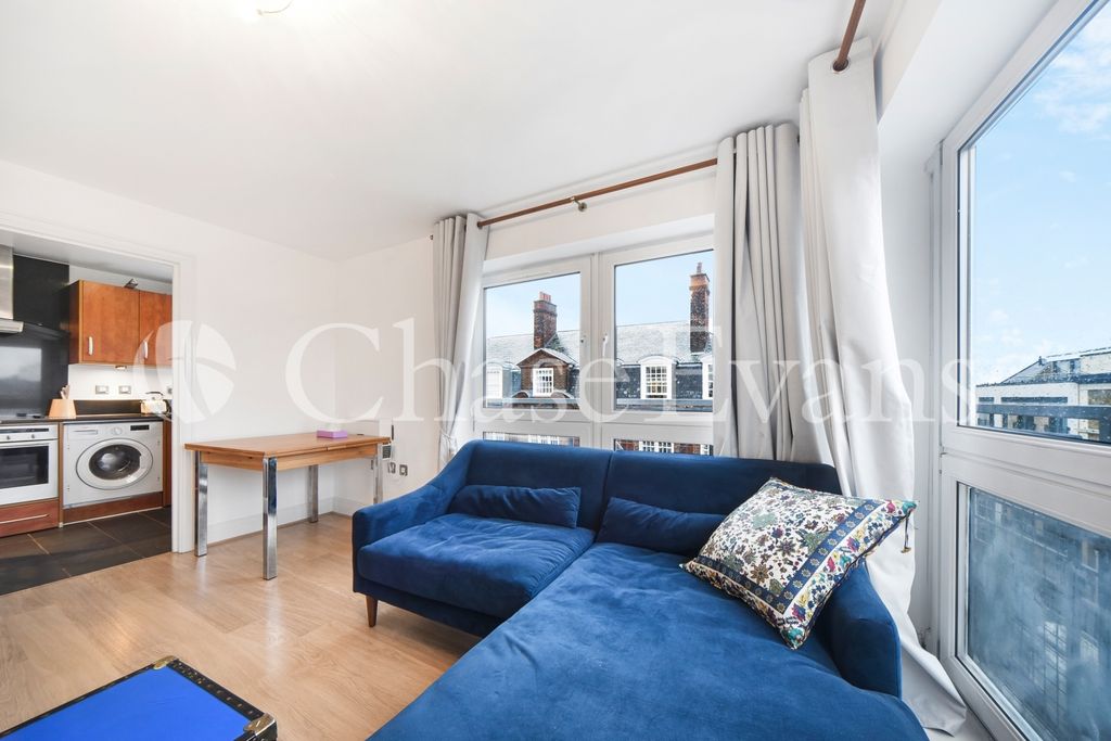 Property photo 3 of 17 Living Area