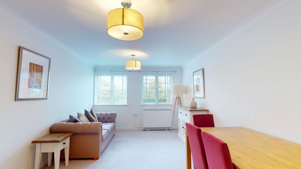 Property photo 3 of 13 Living Room - Angle 1