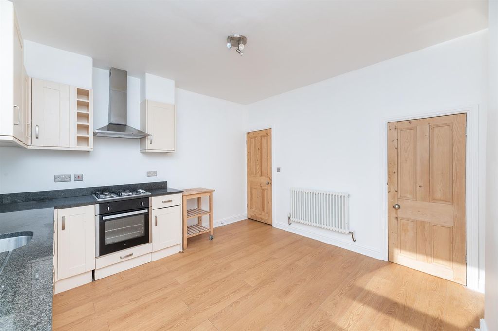 Property photo 2 of 17 Dining Kitchen