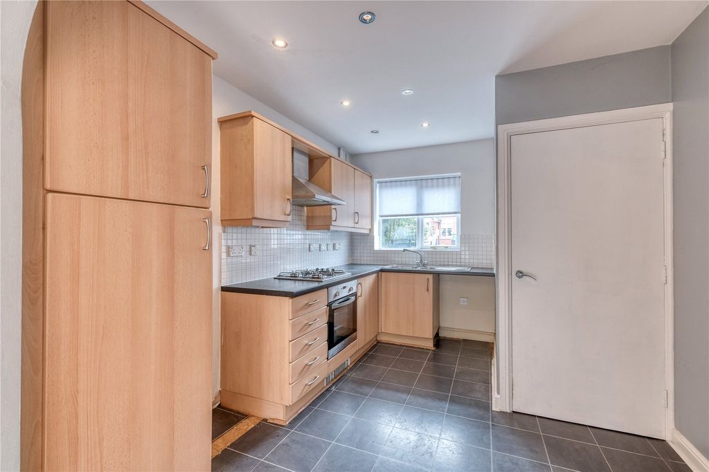 Property photo 2 of 12 Kitchen