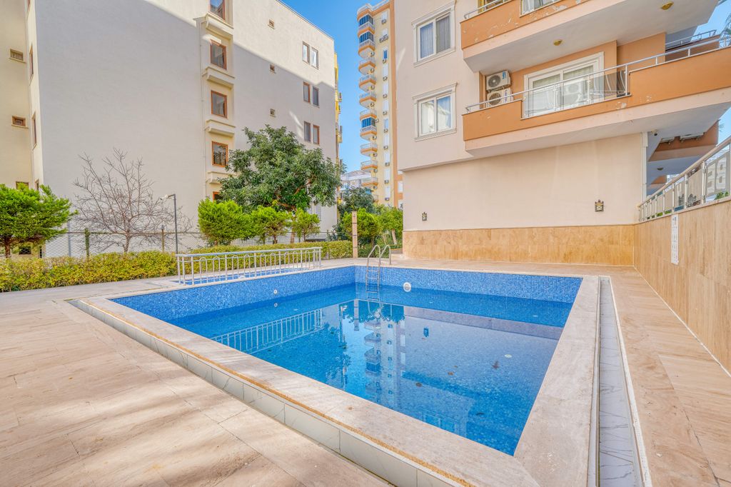 Property photo 2 of 22 Spotless Duplex Apartment For Sale In Mahmutlar, Alanya - Plenty Of Sun Terrace Space Around The Pool