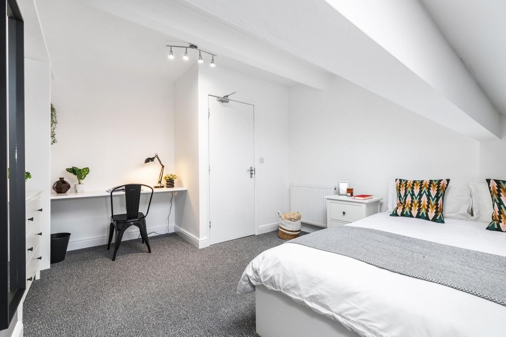 Property photo 1 of 6 A Bright, Neatly Presented Bedroom Featuring A Com...
