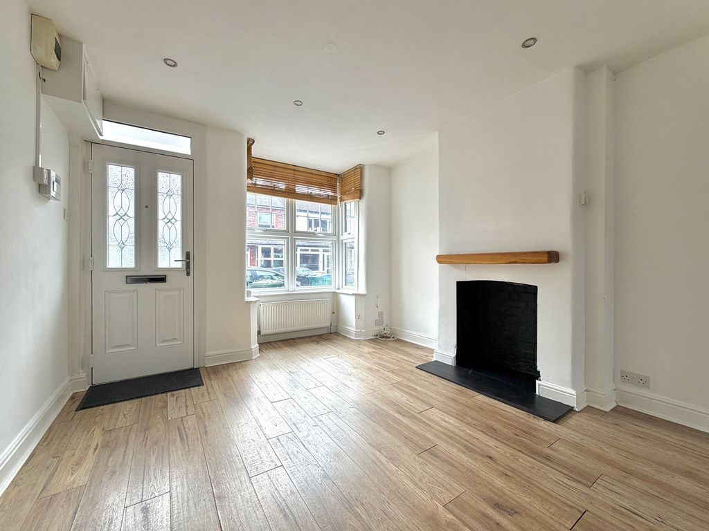 Property photo 2 of 12 Living Area